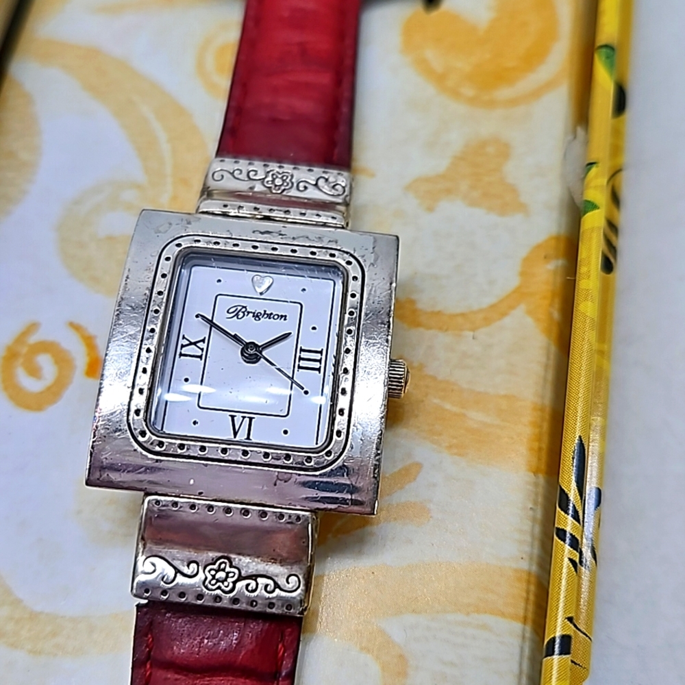 BEAUTIFUL Brighton watch. Reversible leather strap,red and black. Watch is silve